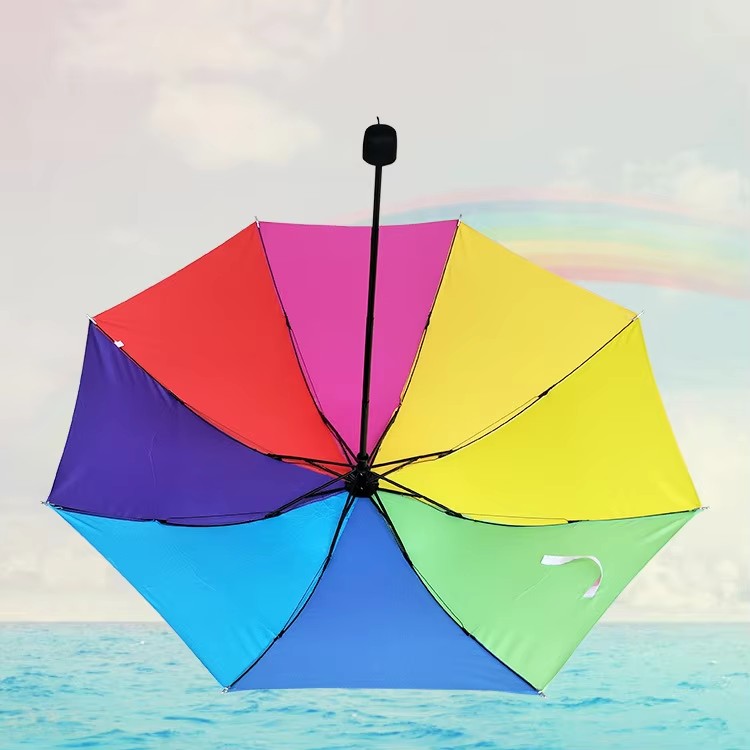 Draagbare 3-voudige regenboogparaplu